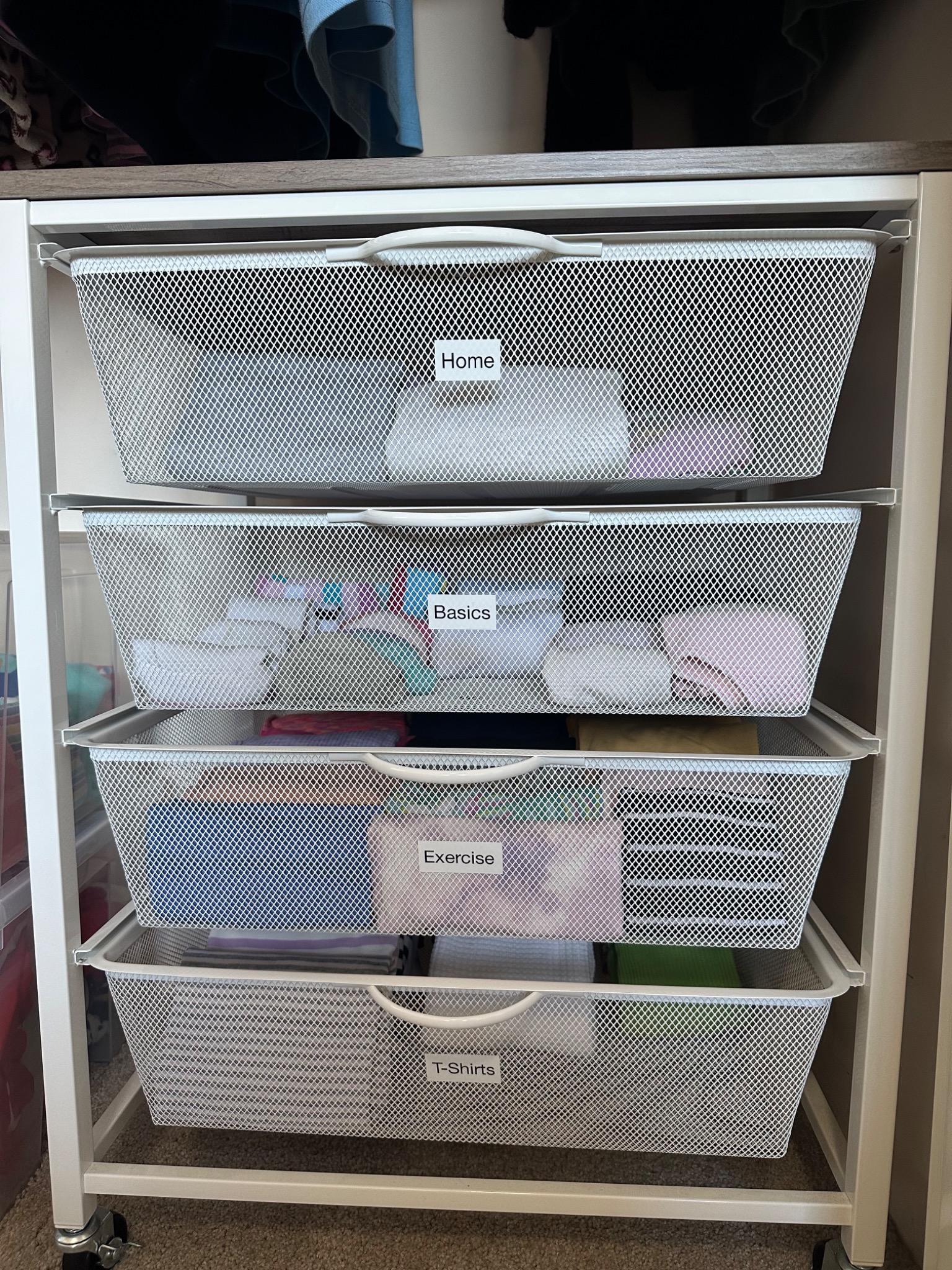Wardrobe drawers labelled by life scenario